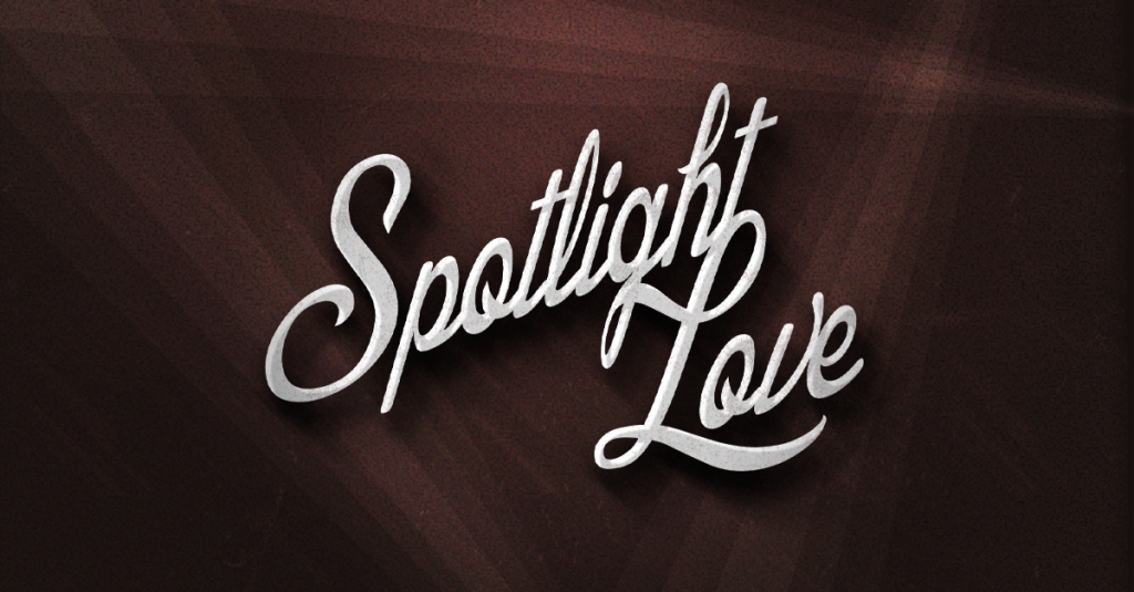 A title image with a vintage feel and a dark vignette that says "Spotlight Love"